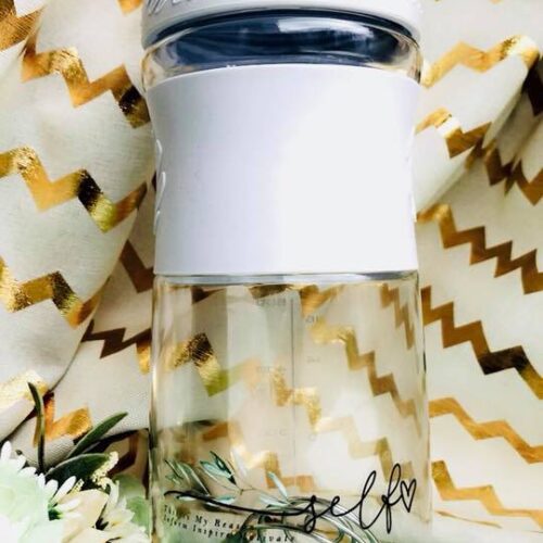 Clear Blender Bottle with white lid and whisk ball.